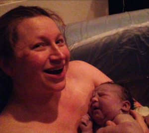 Happy mom with newborn
